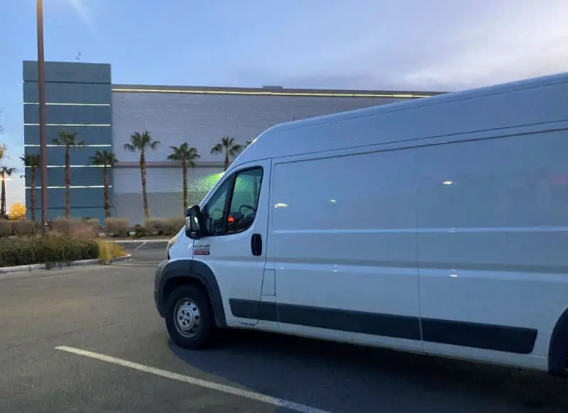 White Van parked On Empty Parking Lot